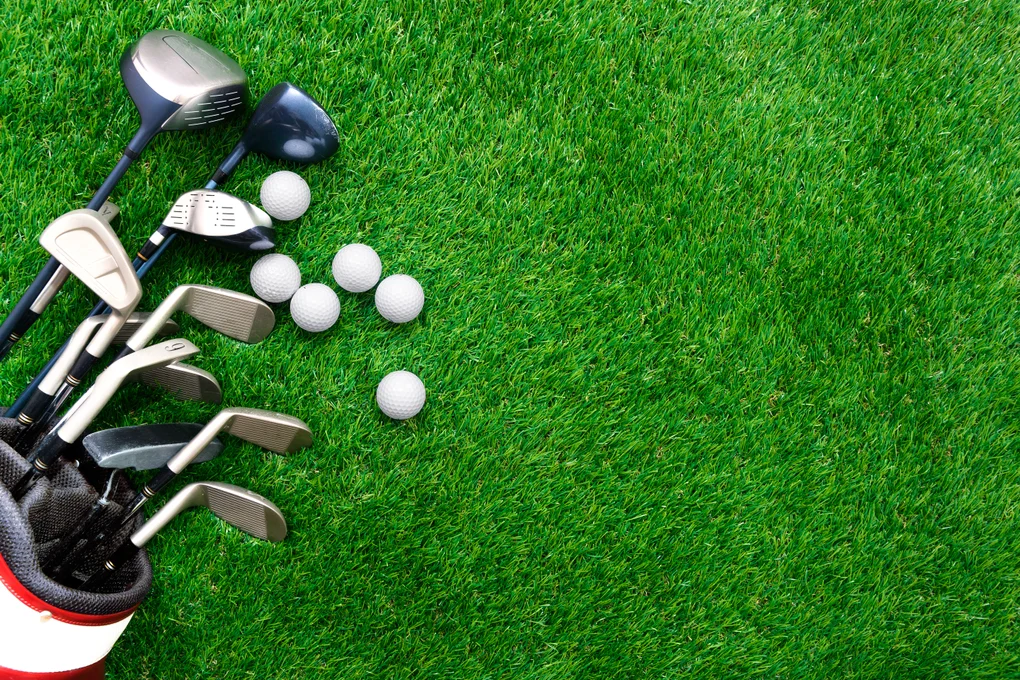 golf clubs on grass