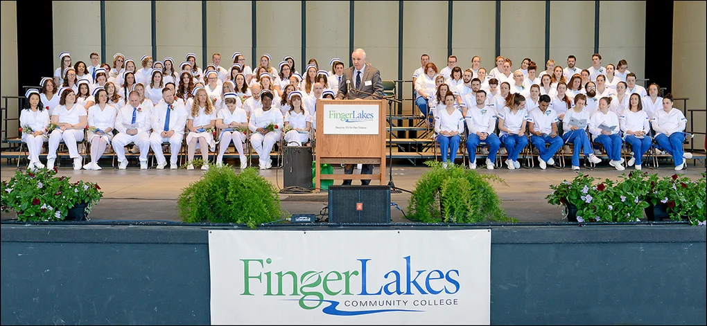 Nurses and nursing students on risers at graduation