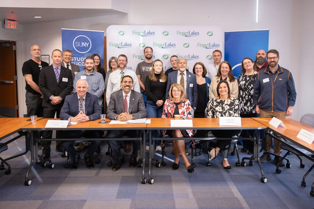 Attendees of the April 23 SUNY Reconnect event posing for a group photo.