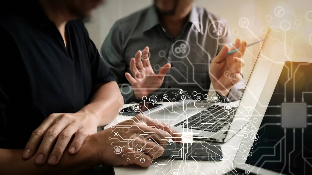 AI users collaborate, using technology to reach goals.