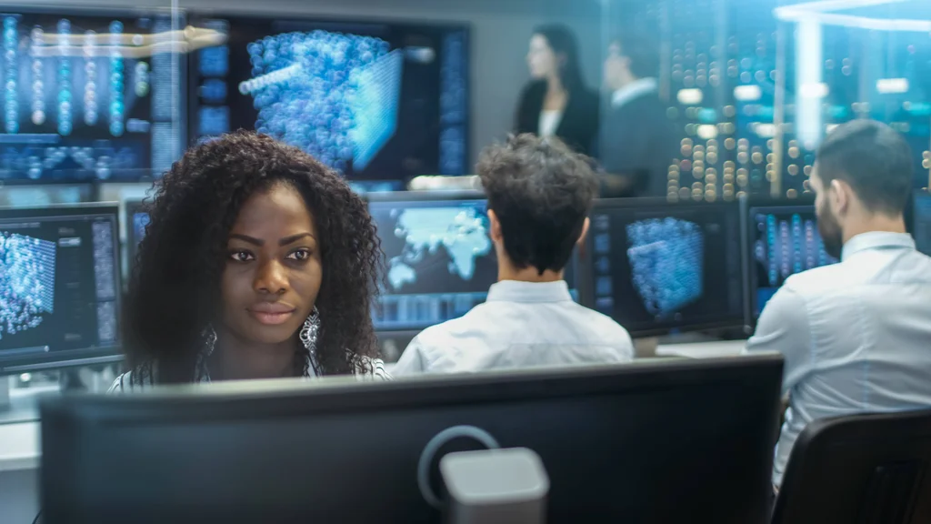 Students working at computer workstations.