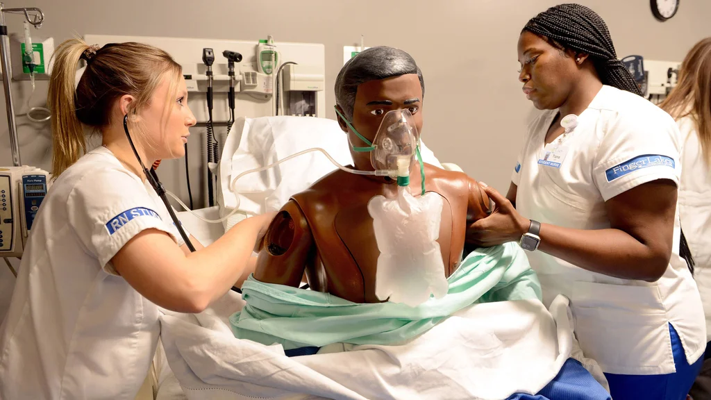 Nursing students practicing medical treatment in the Sands Family Center for Allied Health at FLCC.