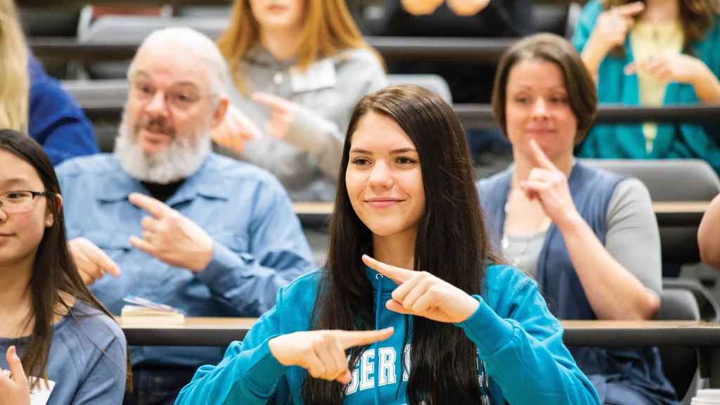 Student signing