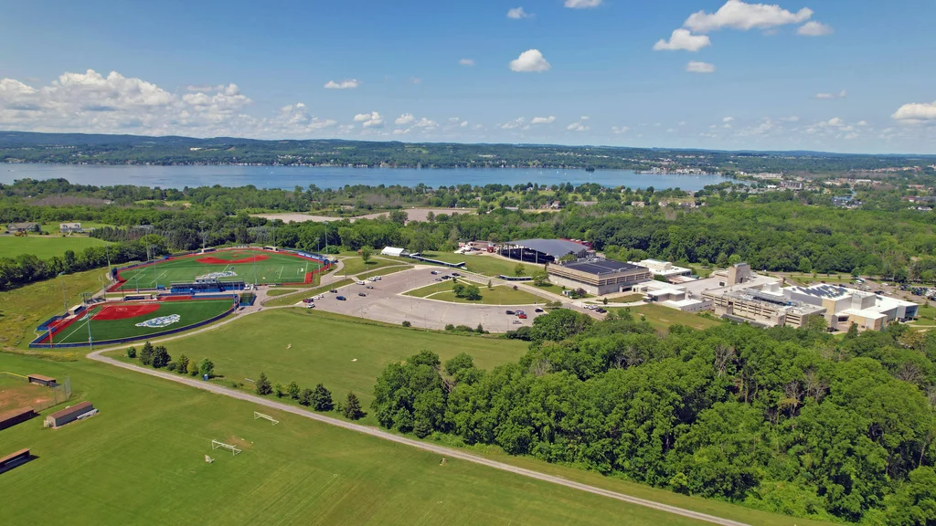 FLCC's main campus and athletic facilities seen from above with Canandaigua Lake in the background.