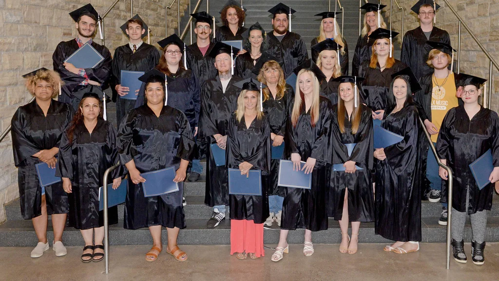 Adult basic education students graduating with their high school equivalency (HSE) diploma.