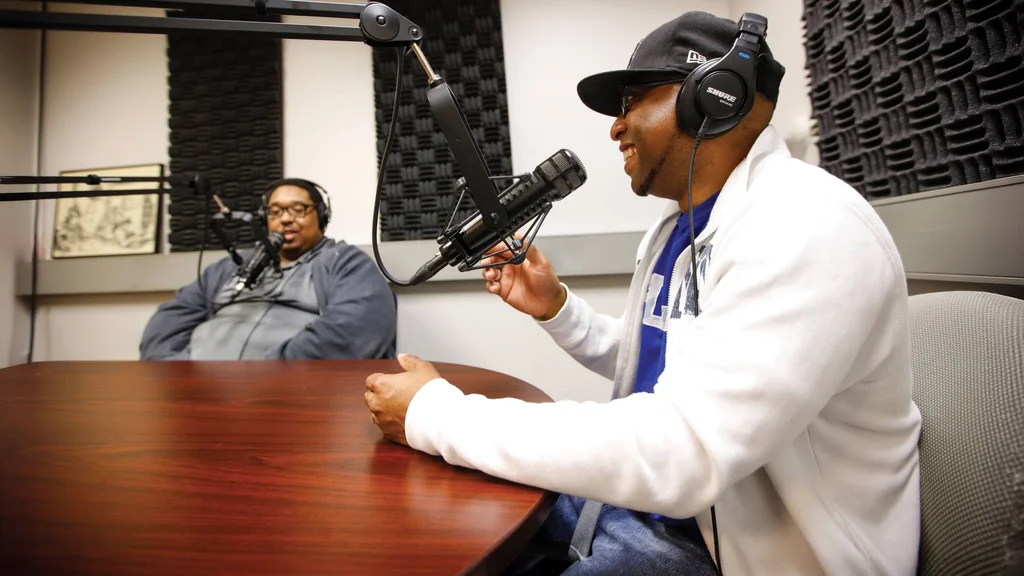 Johnny Gamble and another student in the studio.
