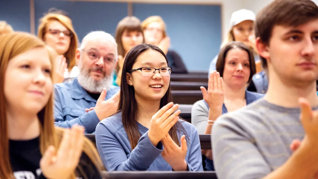 FLCC students practicing American Sign Language together in a class.