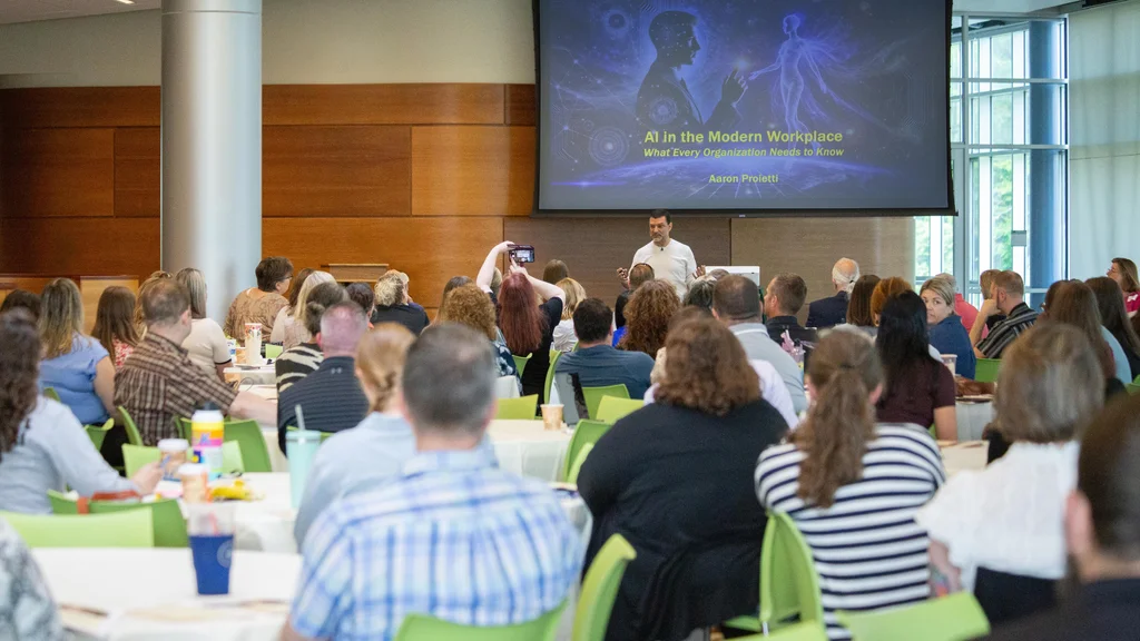 Attendees learn about Artificial Intelligence at FLCC's AI Conference.