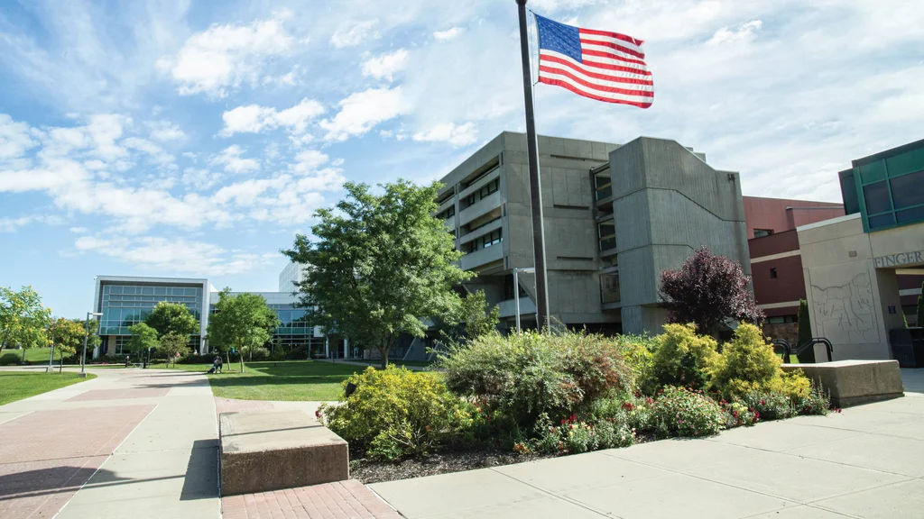 Military friendly school logo and a front view of the FLCC main campus building.