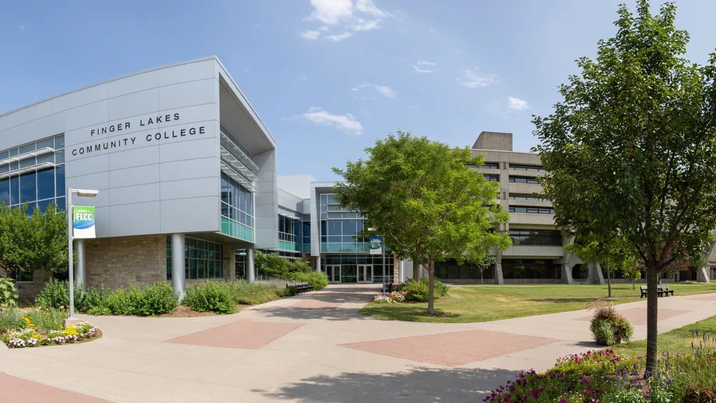 FLCC campus in the summer with green leafy trees