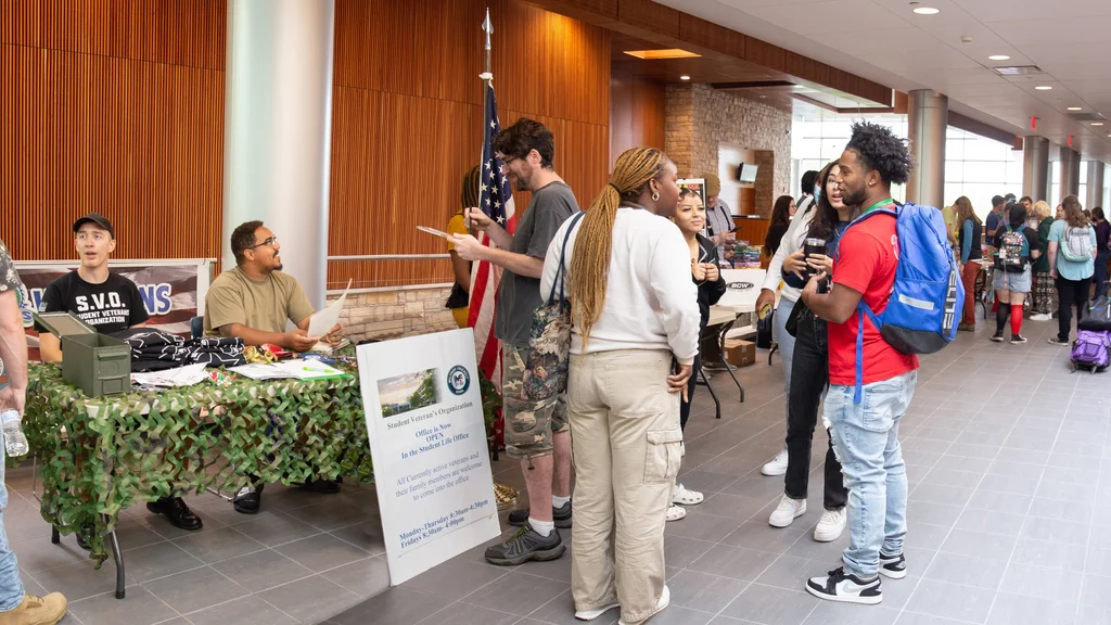 FLCC students hanging out and learning about student life opportunities during Club Table Day.