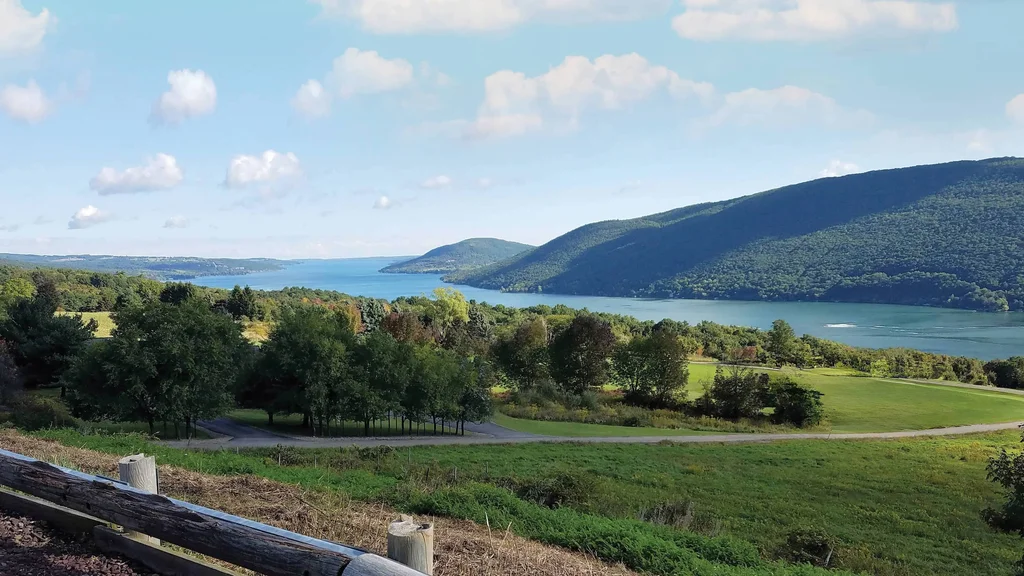 Canandaigua Lake and the surrounding tree-covered hills.