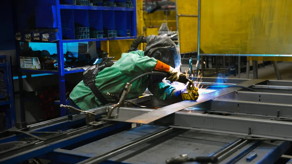 FLCC welding graduate in the workplace.