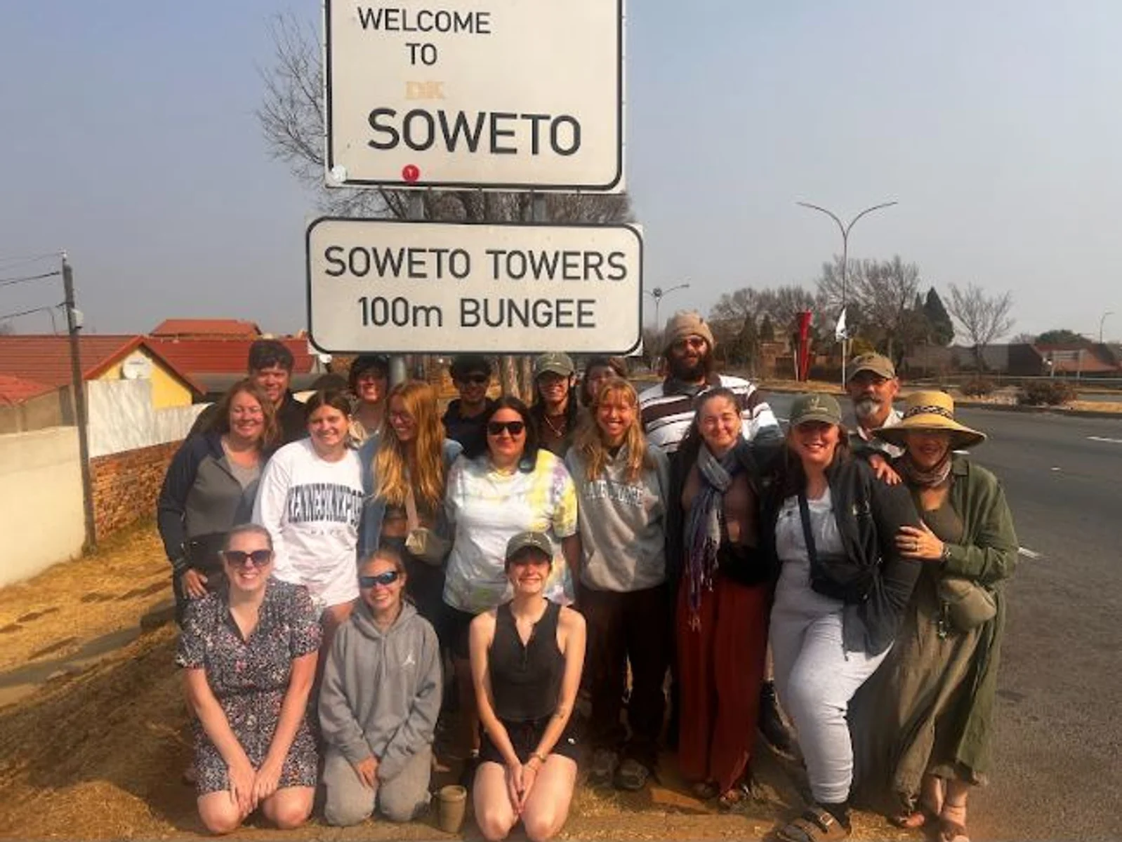 A view of passengers in an open air truck on a game reserve