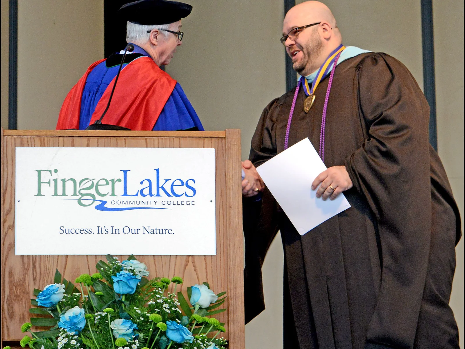 President presenting award to M. Van Etten