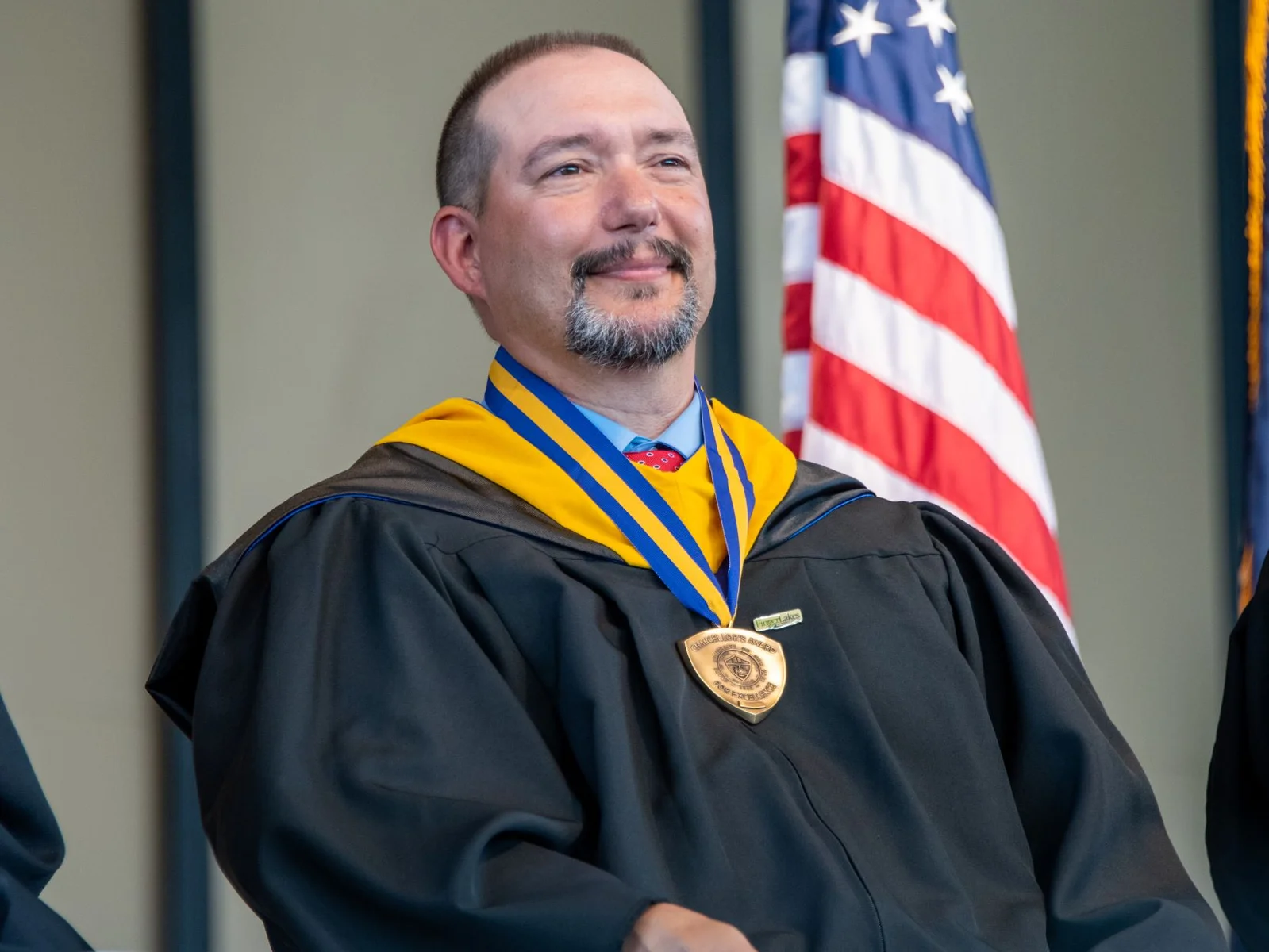 President presenting award to M. Van Etten