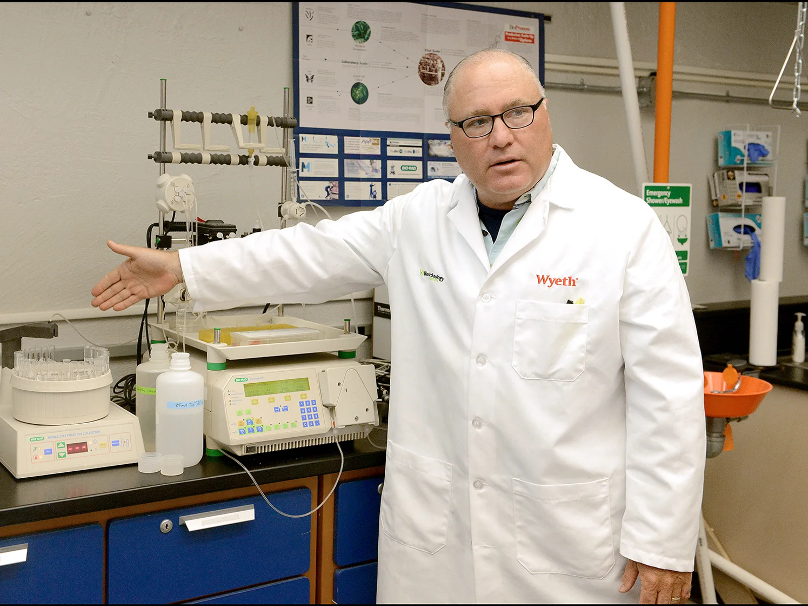 Faculty member in lab coat