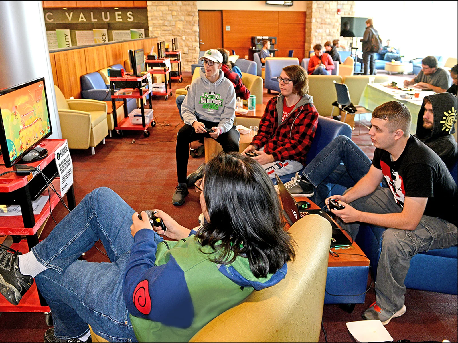 Students playing video games in the FLCC lounge