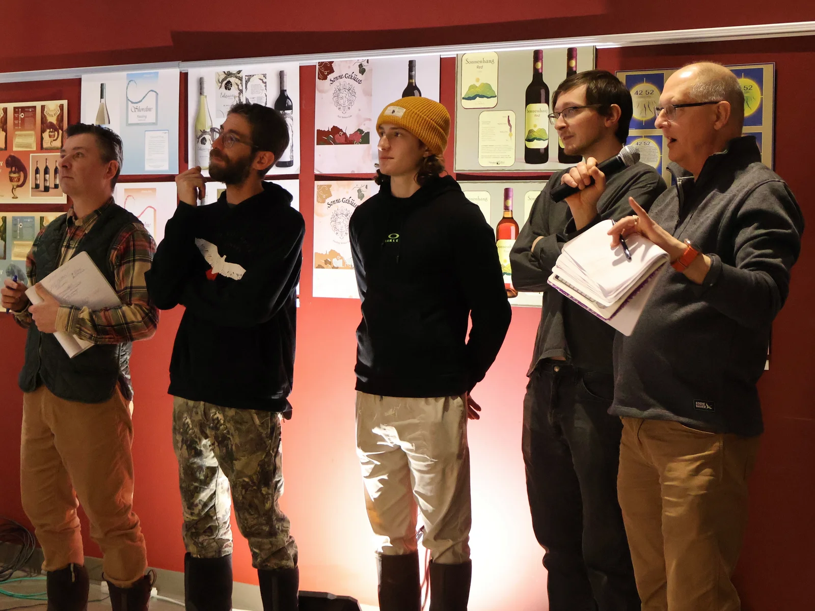 Lauren Turner presenting her design at the fall 2025 FLCC wine label design competition.