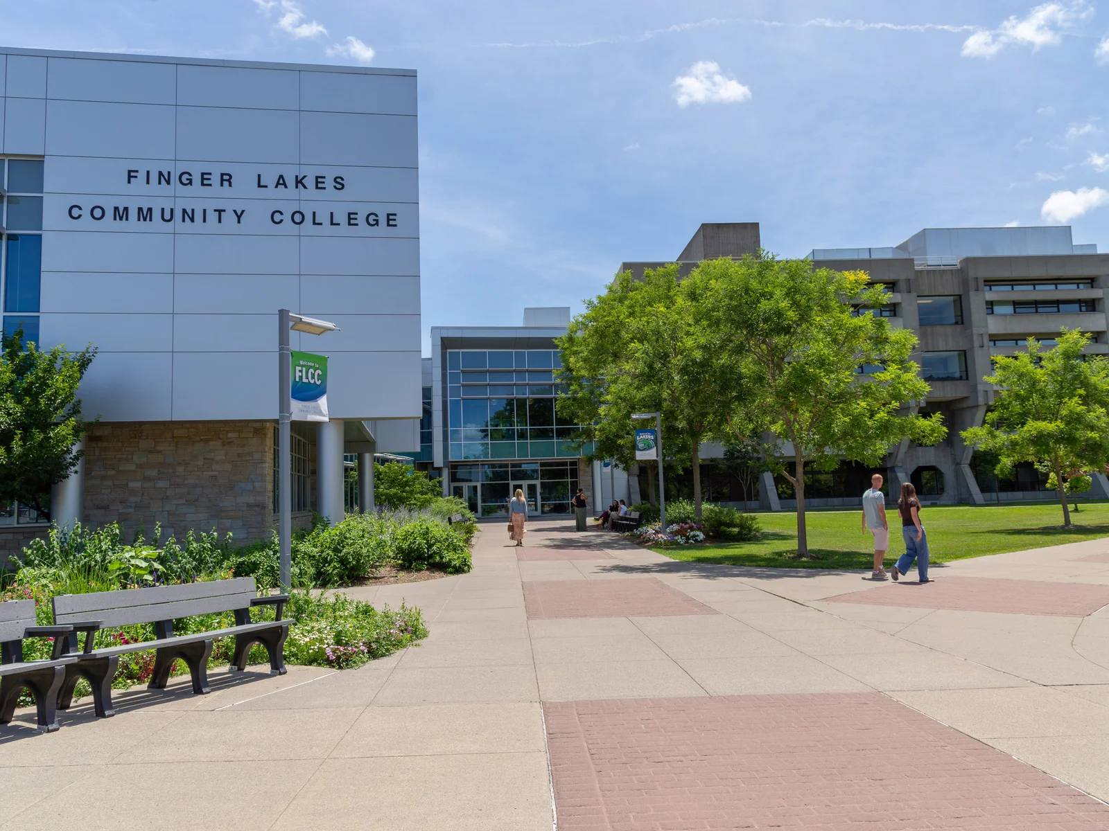 FLCC in the summertime as people walk around campus.