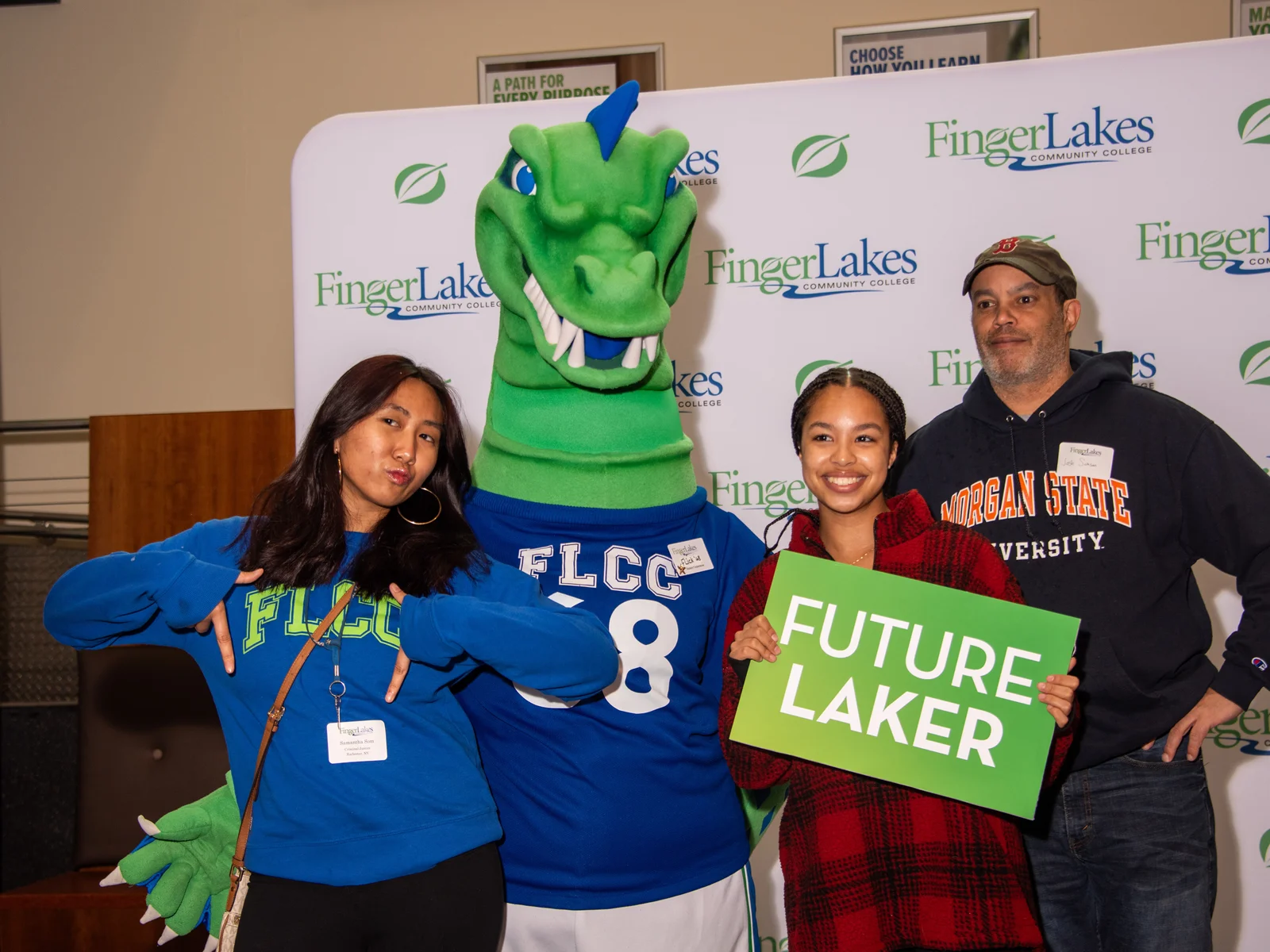 Recently accepted students and their guest pose with the FLCC mascot.