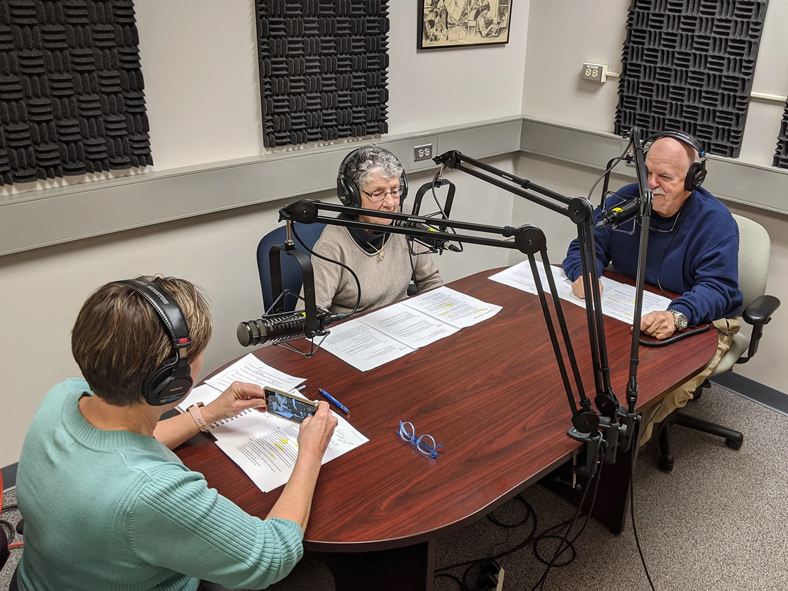 Three people making a podcast