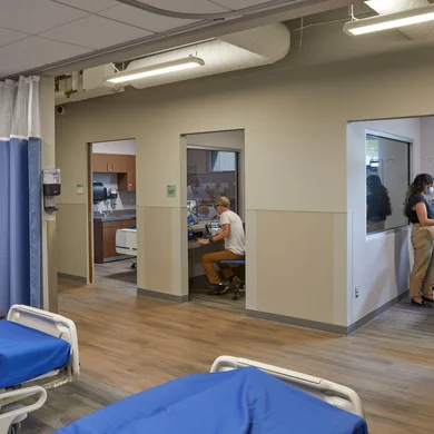 Nursing students practicing medical treatment in the Sands Family Center for Allied Health at FLCC.