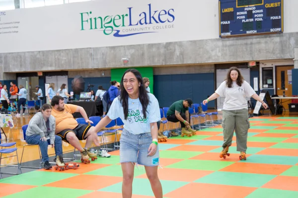 Students rollerskating on May Day in the FLCC gymasium