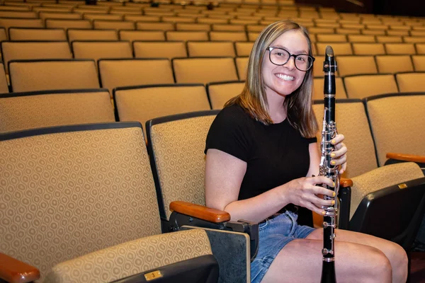 Music student performs clarinet in the FLCC Auditorium.