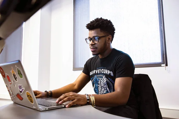 Student using a laptop computer
