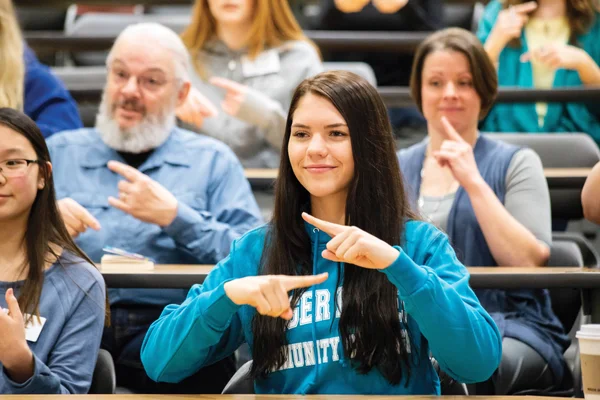 Student signing