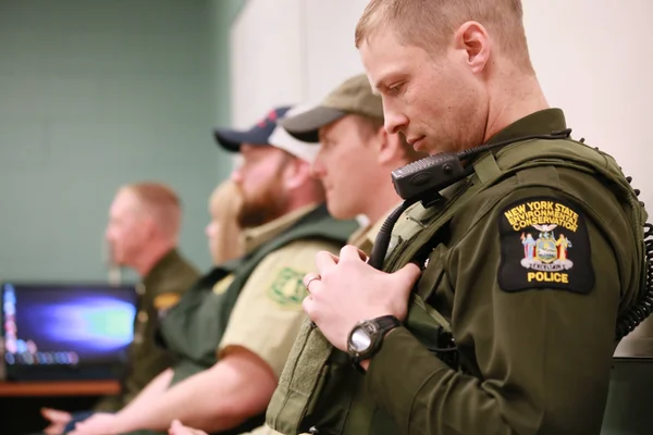 A panel of New York State Environmental Conservation Officers.
