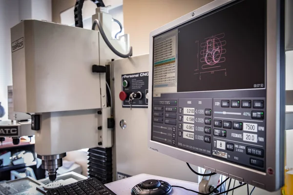 Control panel of the large-scale CNC milling machine.