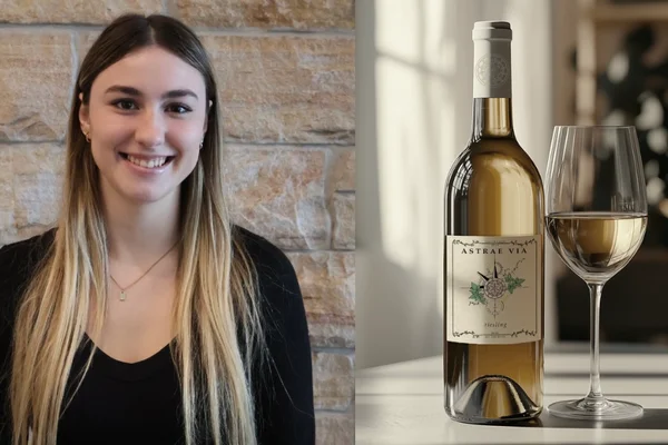 Wine label winner, Alexis Ecker, alongside a wine bottle mockup of the winning design, Astrae Via