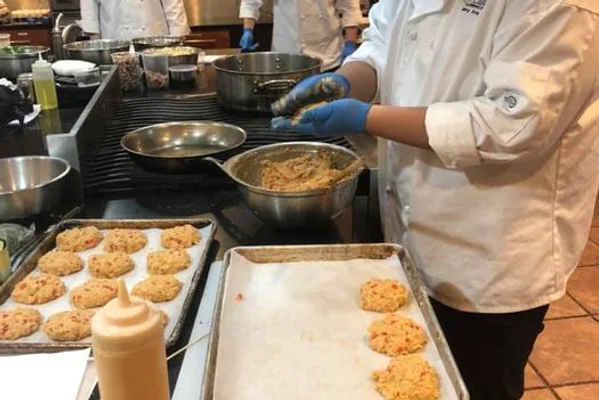 Man cooking in a restaurant kitchen