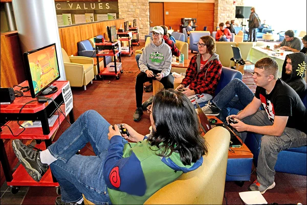 Students playing video games in the FLCC lounge