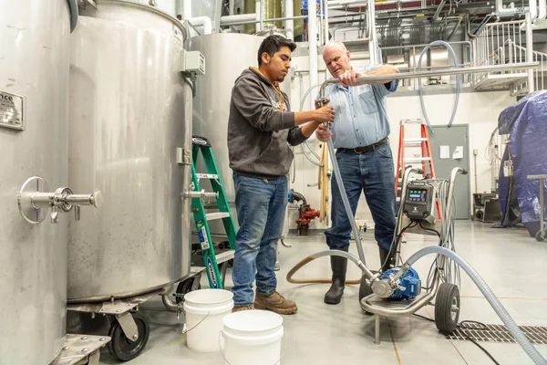 Teamwork at the FLCC Viticulture and Wine Center.