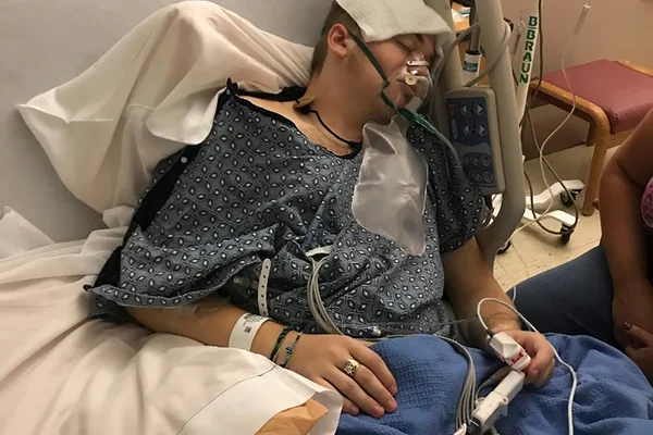 Photo shows teenager Giovanni Marino in a hospital bed. 