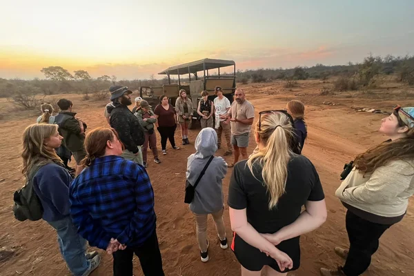 A group of students outside in Great Kruger National Park, South Africa.