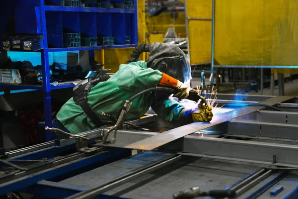 FLCC welding graduate in the workplace.