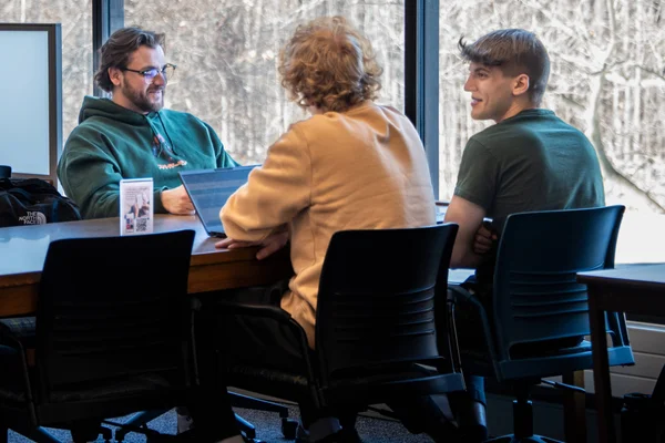 Three FLCC students study at together in the Library at main campus in Canandaigua, NY.