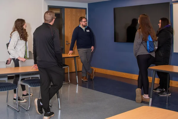 FLCC Admissions Counselor leads a campus tour.