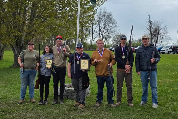 Club target members pose with trophies from the May 2 event.