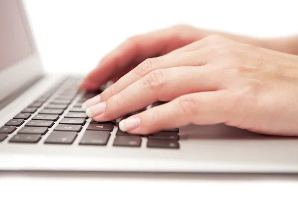 FLCC student uses a laptop to complete coursework and pursue an education.