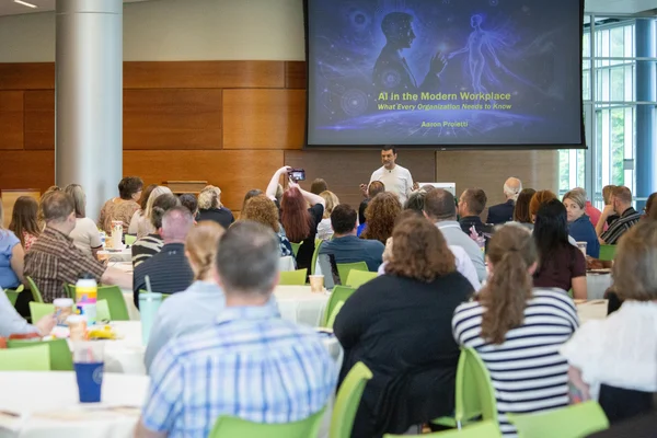 Attendees learn about Artificial Intelligence at FLCC's AI Conference.