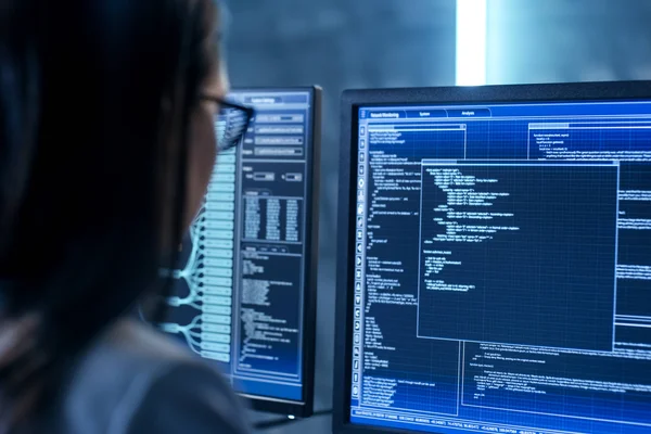 A student at a computer display programming a network switch.