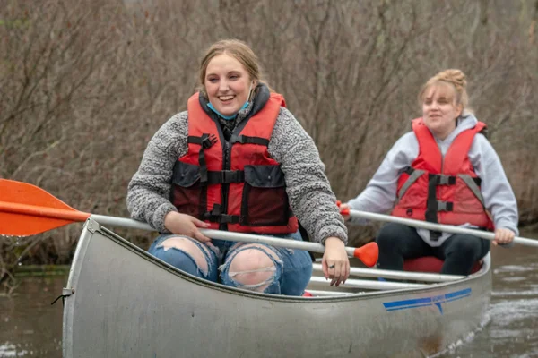 Two community members canoeing on Honeoye Lake.