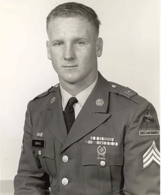 Young man posing military uniform