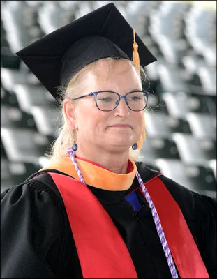 Woman in academic regalia