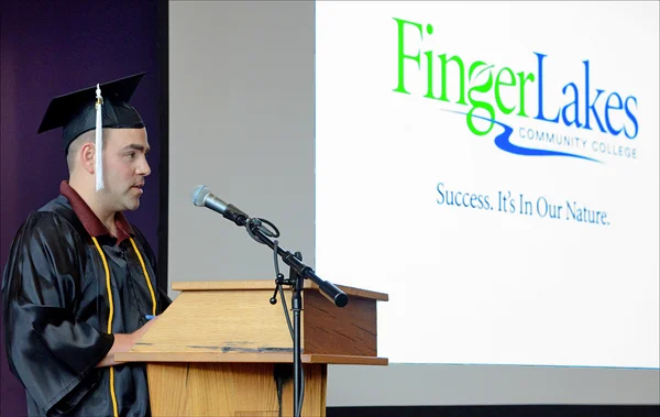 Graduate at podium
